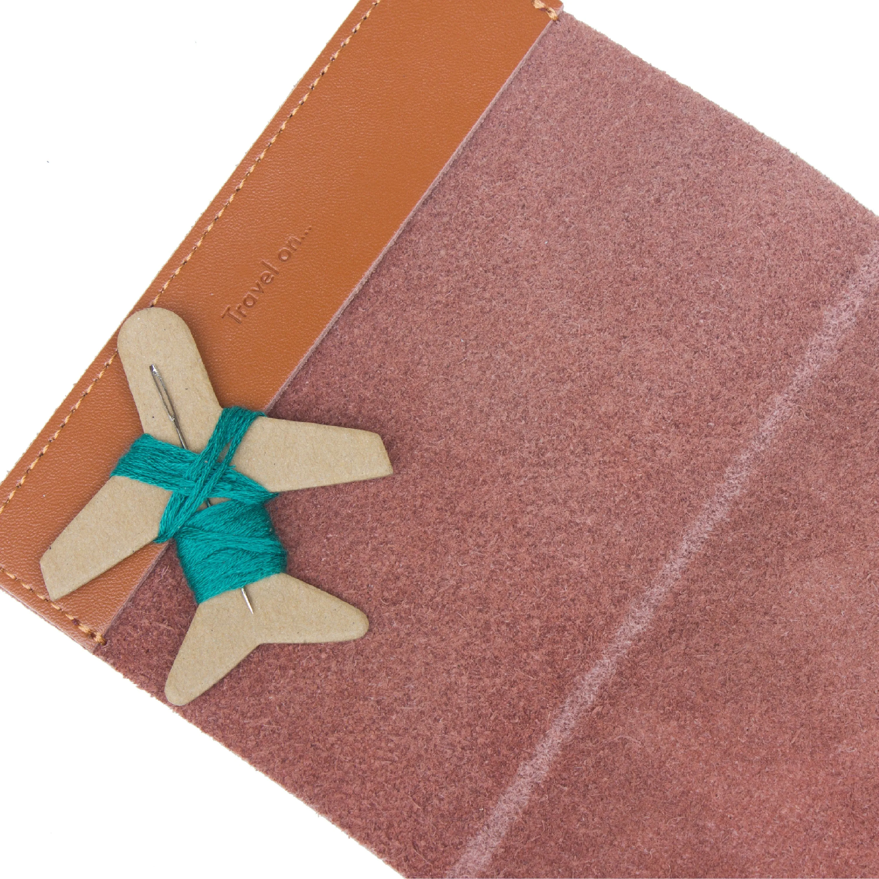 Stitch passport cover in brown